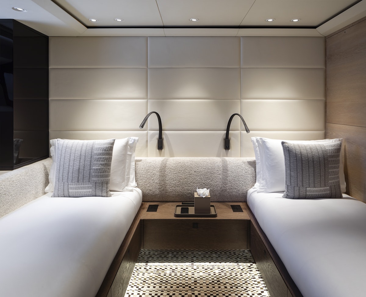 a room with a couple of beds aboard TWIZZLE Yacht for Charter
