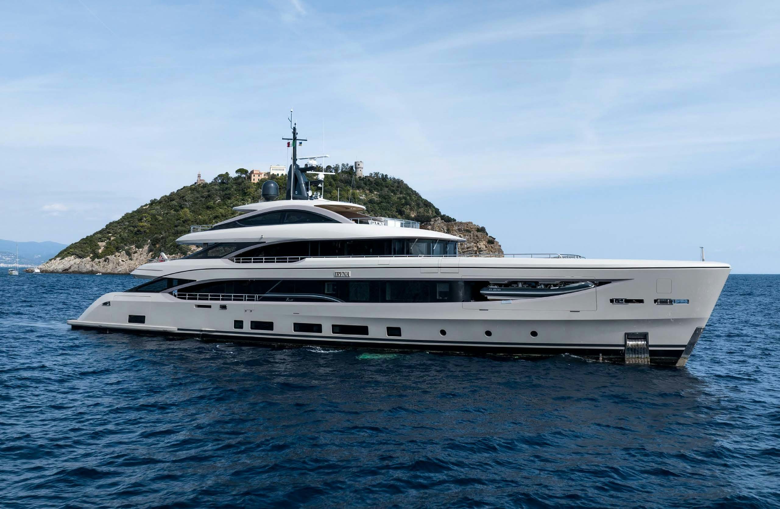 a white yacht in the water aboard IRYNA II Yacht for Sale
