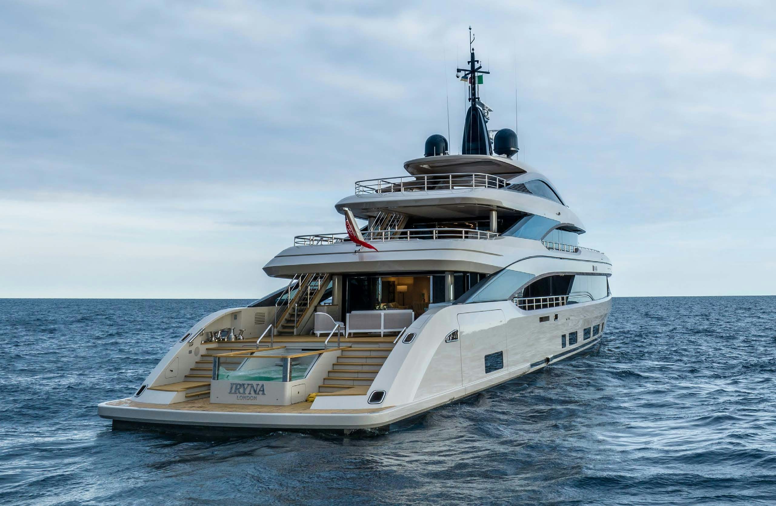 a white yacht in the water aboard IRYNA II Yacht for Sale