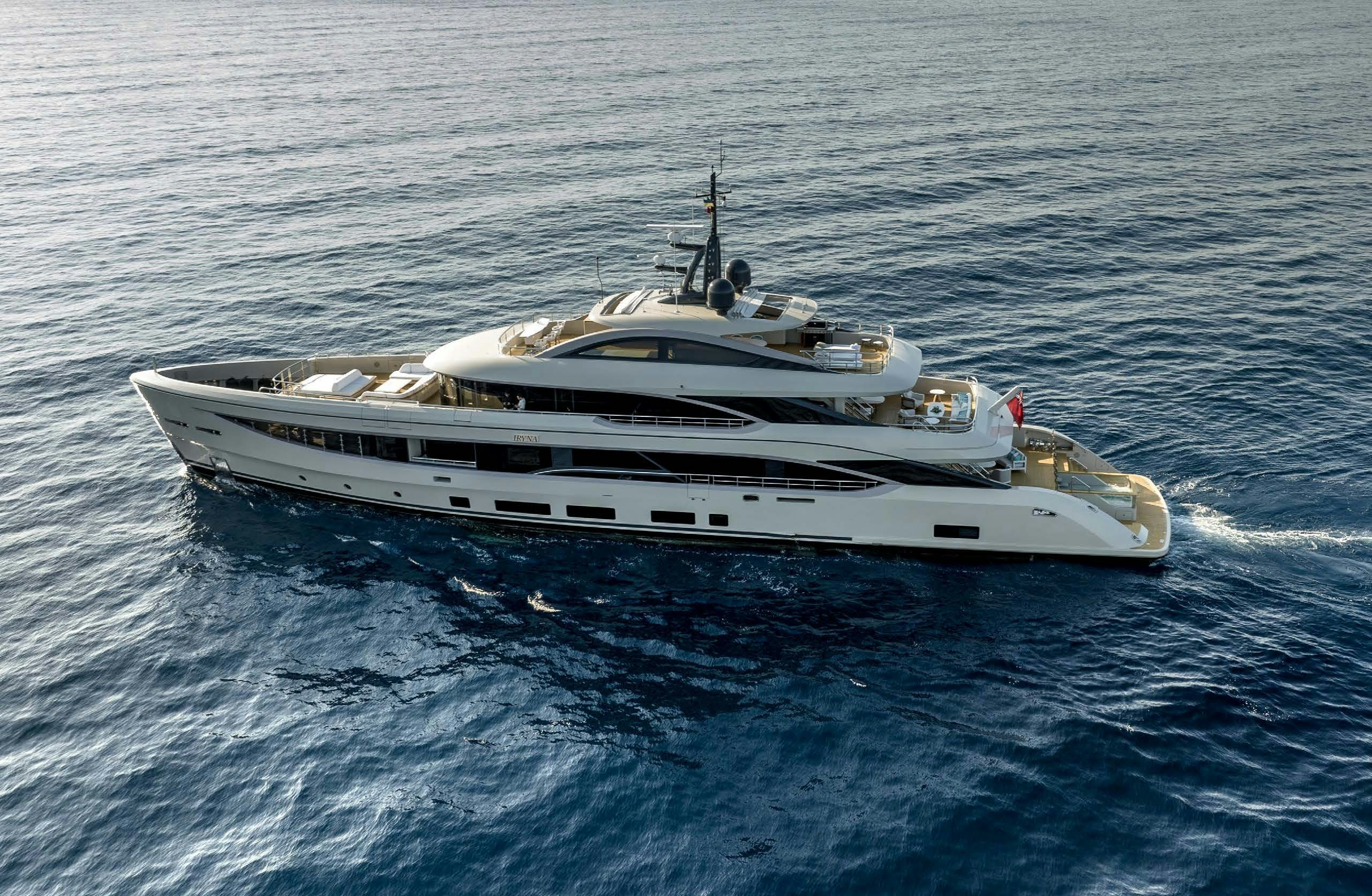 a white yacht in the water aboard IRYNA II Yacht for Sale