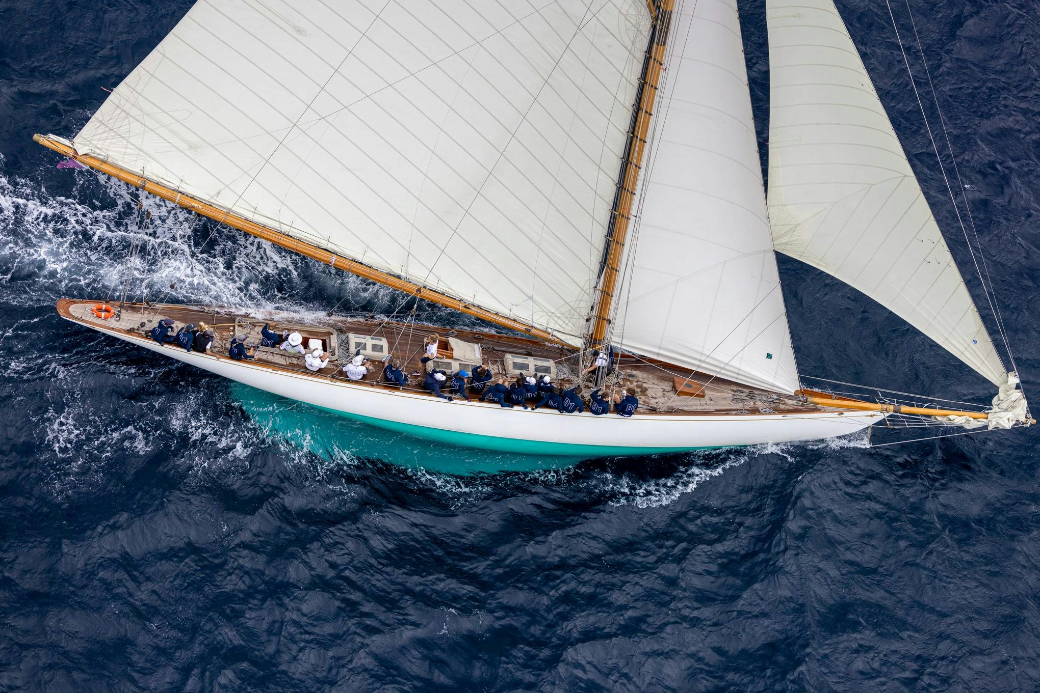 a group of people sailing on a sailboat aboard MARISKA Yacht for Sale