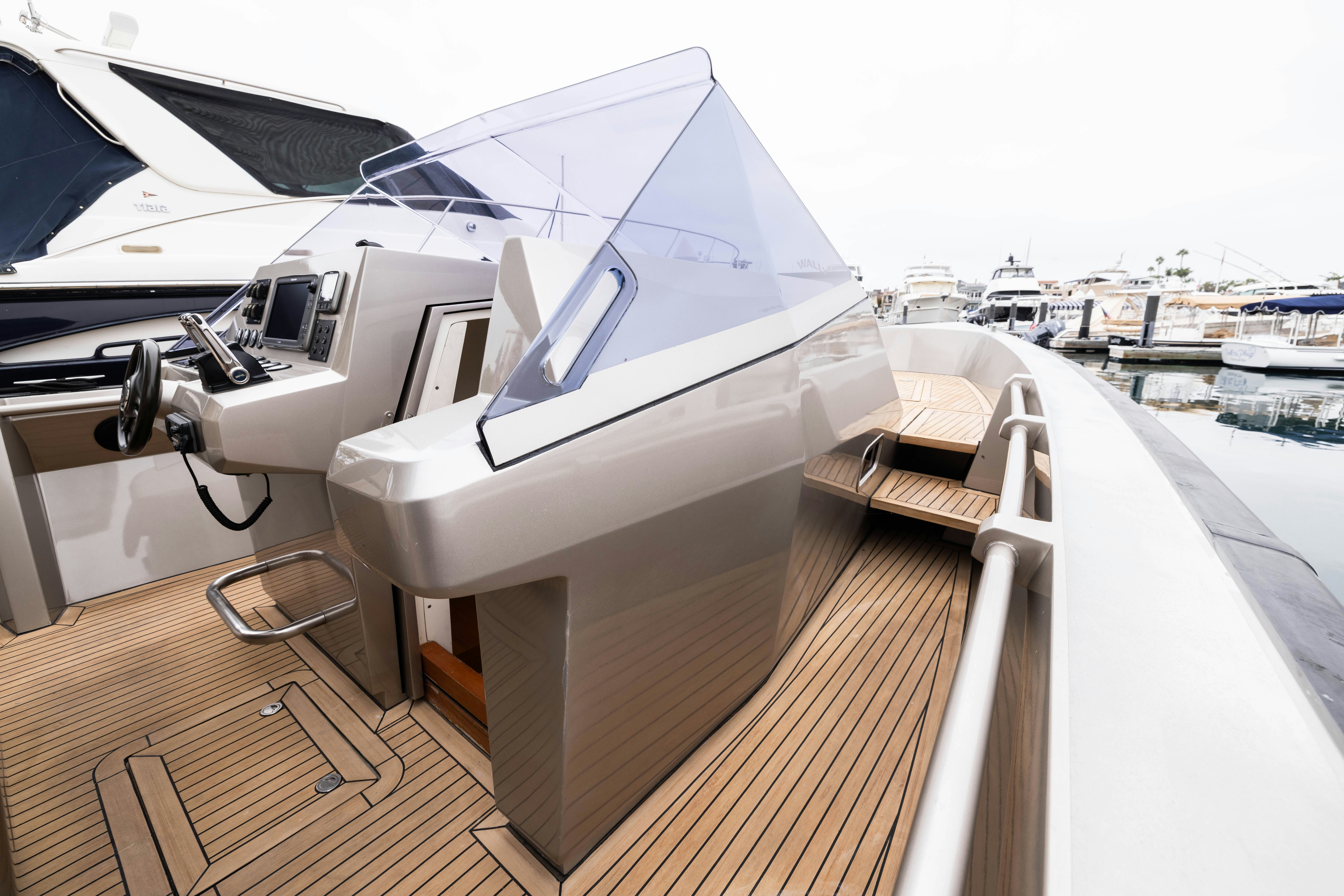 a boat on a deck aboard FAN SEA II Yacht for Sale