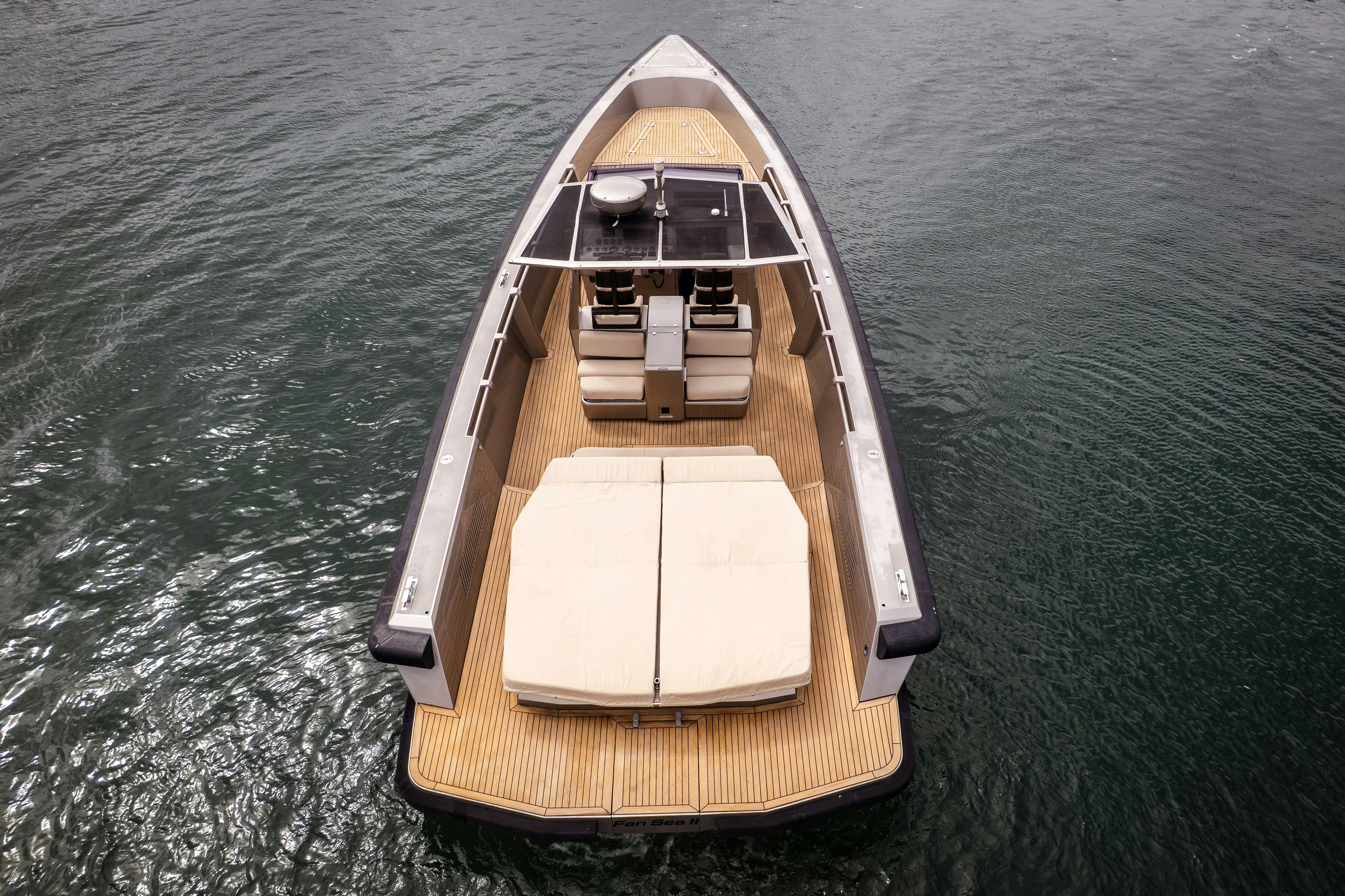 a wooden boat on the water aboard FAN SEA II Yacht for Sale