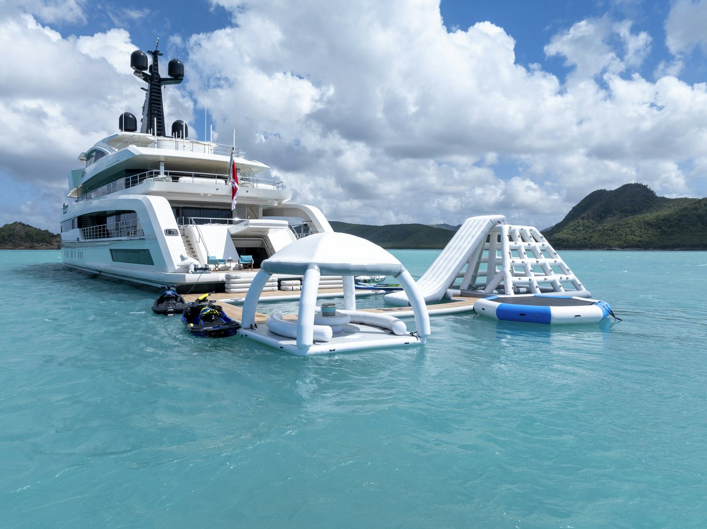 a couple of boats in the water aboard RIO Yacht for Charter