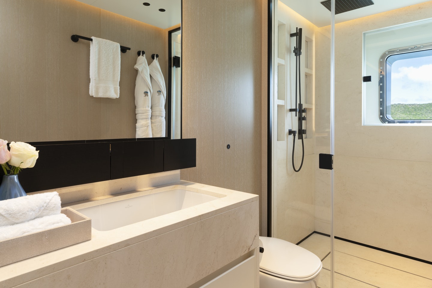 a bathroom with a sink and a toilet aboard RIO Yacht for Charter
