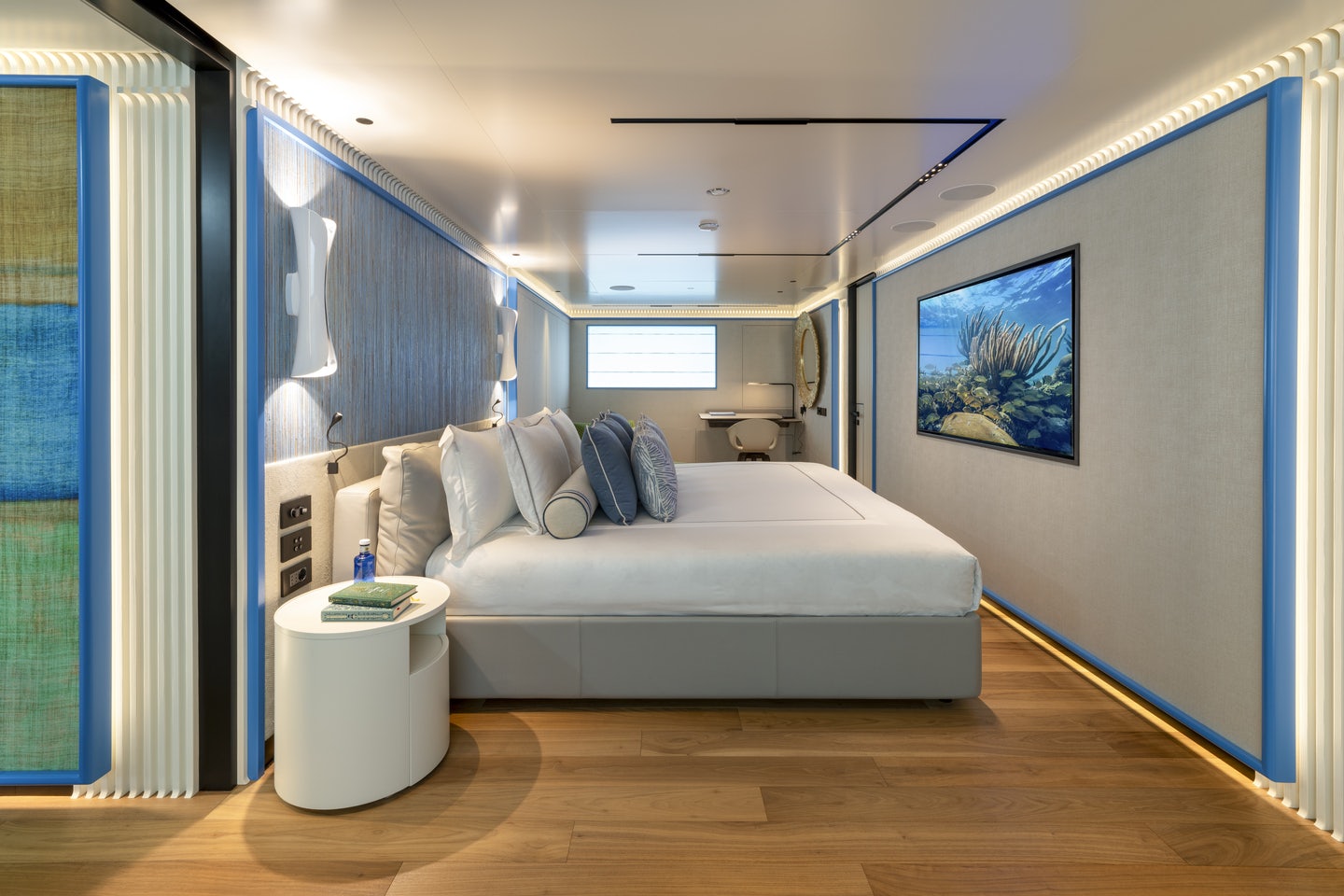 a living room with a couch and a table aboard RIO Yacht for Charter