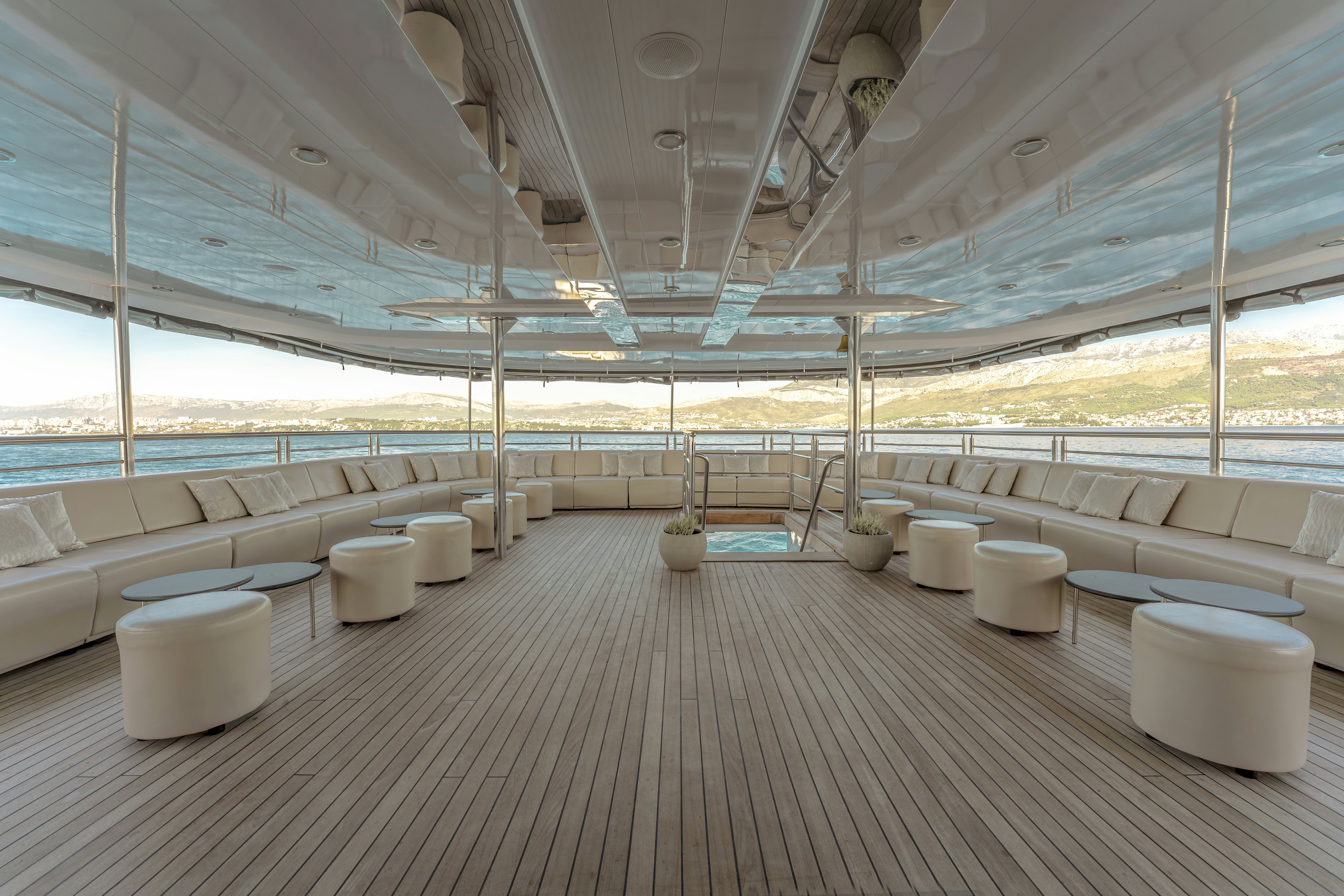 a room with a large ceiling aboard CRISTAL Yacht for Charter
