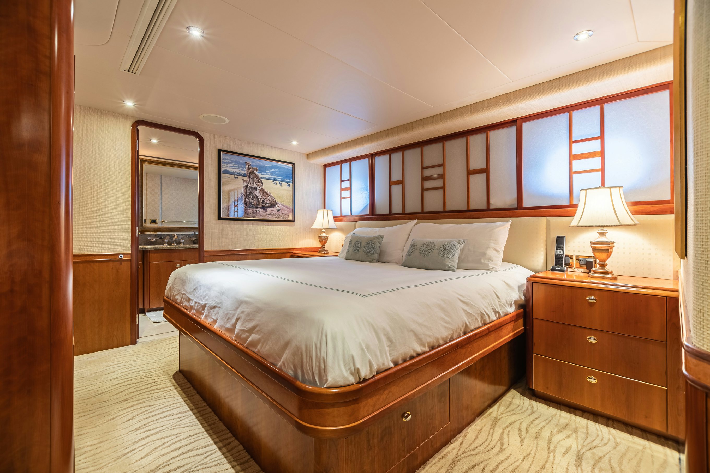 a bed in a room aboard SERENGETI Yacht for Charter