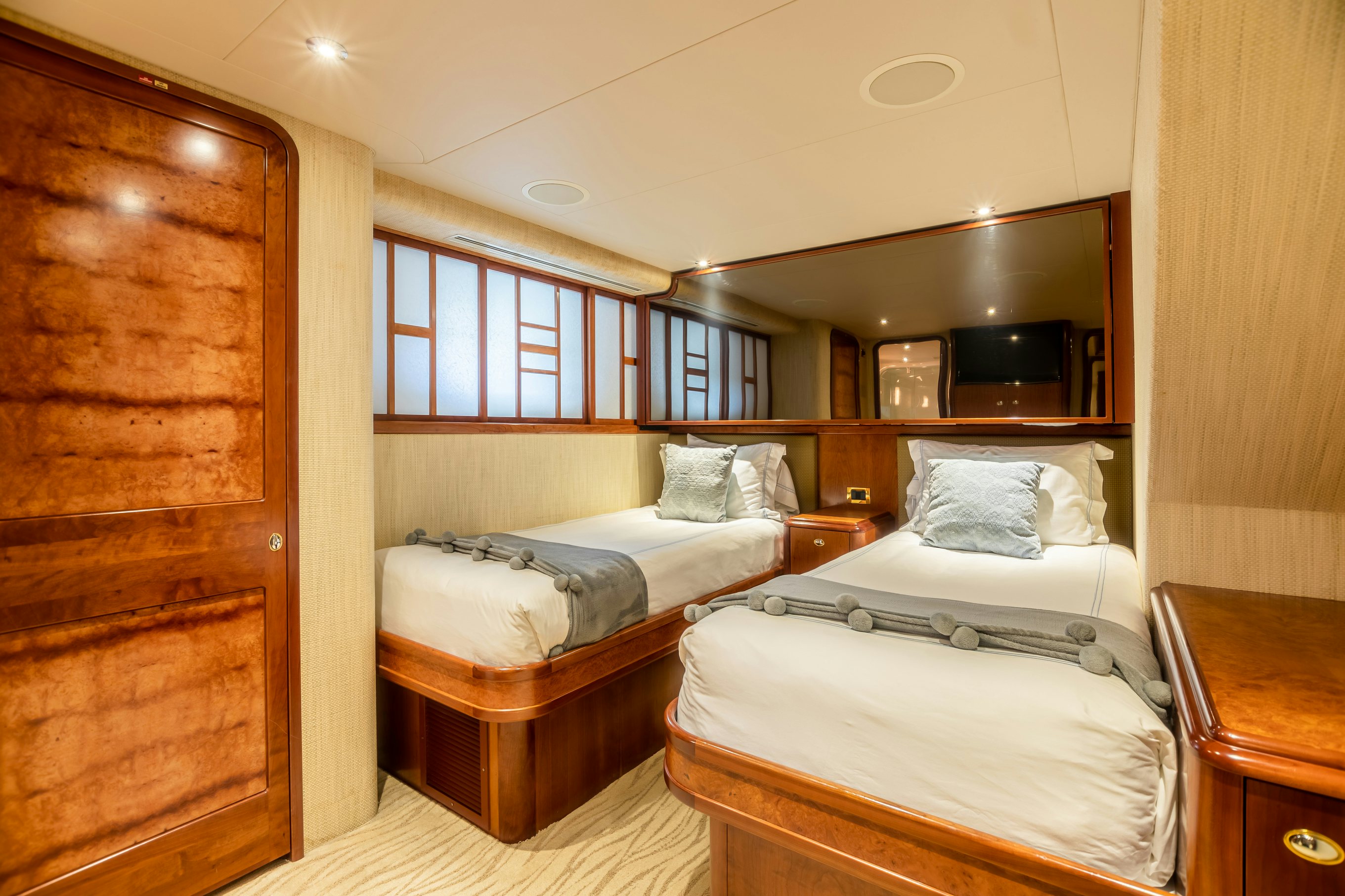 a room with two beds aboard SERENGETI Yacht for Charter