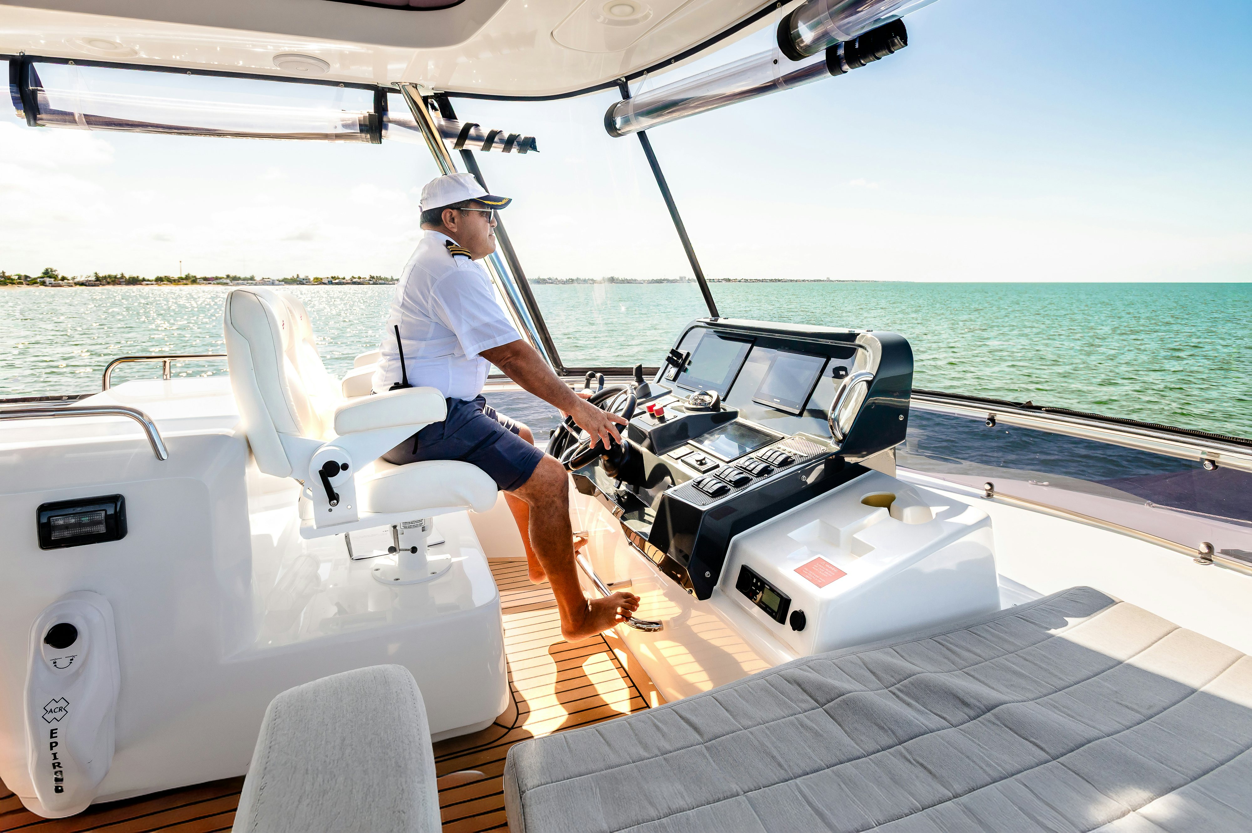 a person sitting on a boat aboard VIAKAREY Yacht for Sale