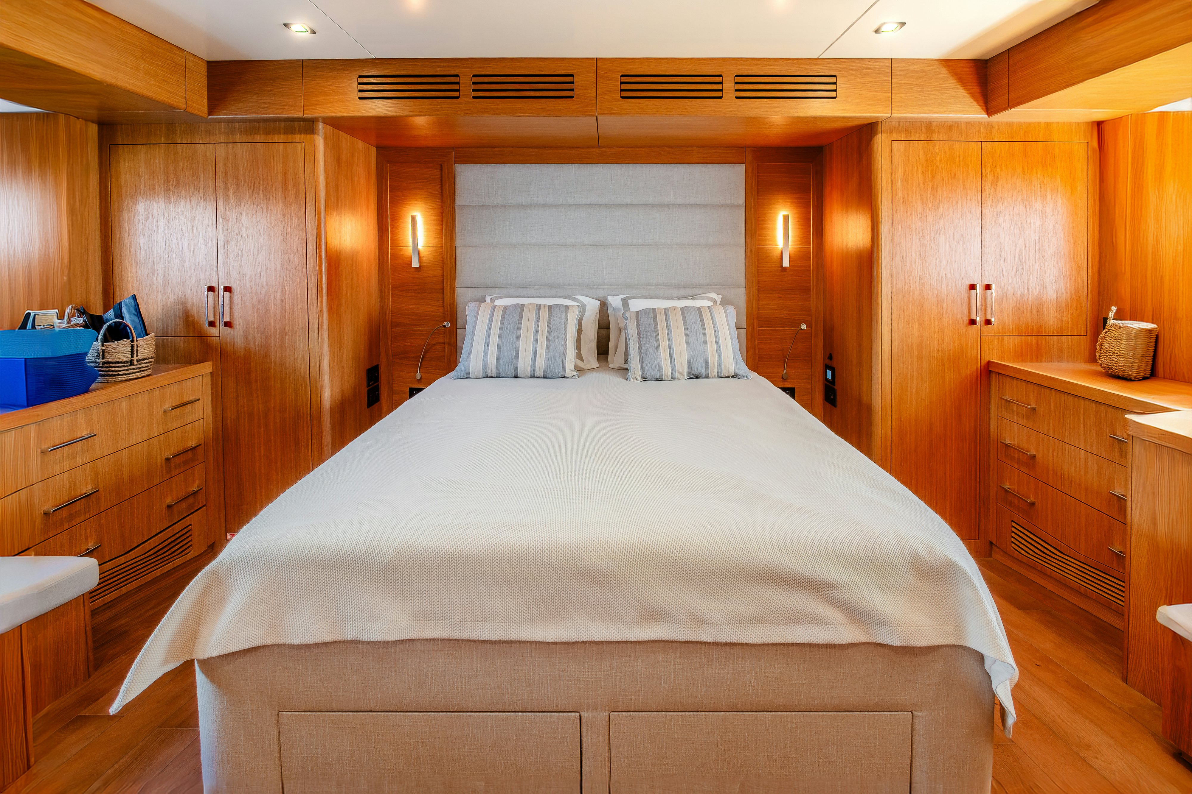 a bed in a room aboard VIAKAREY Yacht for Sale