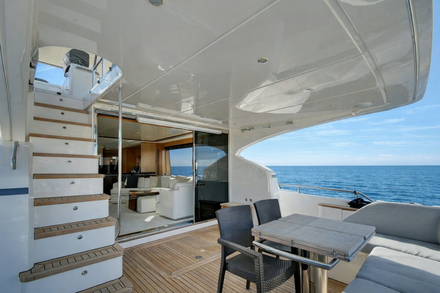 a boat with a wood deck aboard GRAND CRU Yacht for Sale