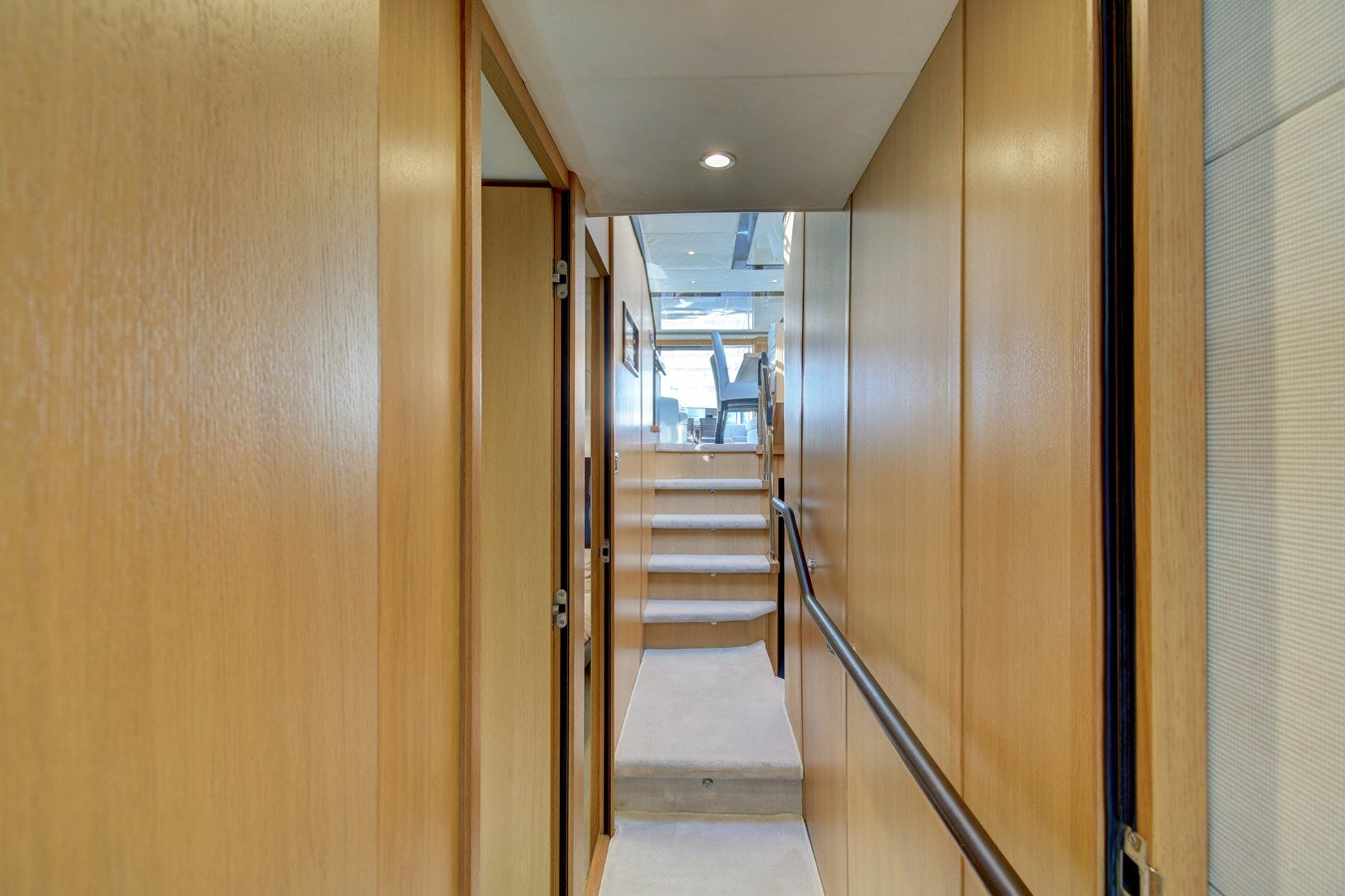 a hallway with a set of doors aboard GRAND CRU Yacht for Sale