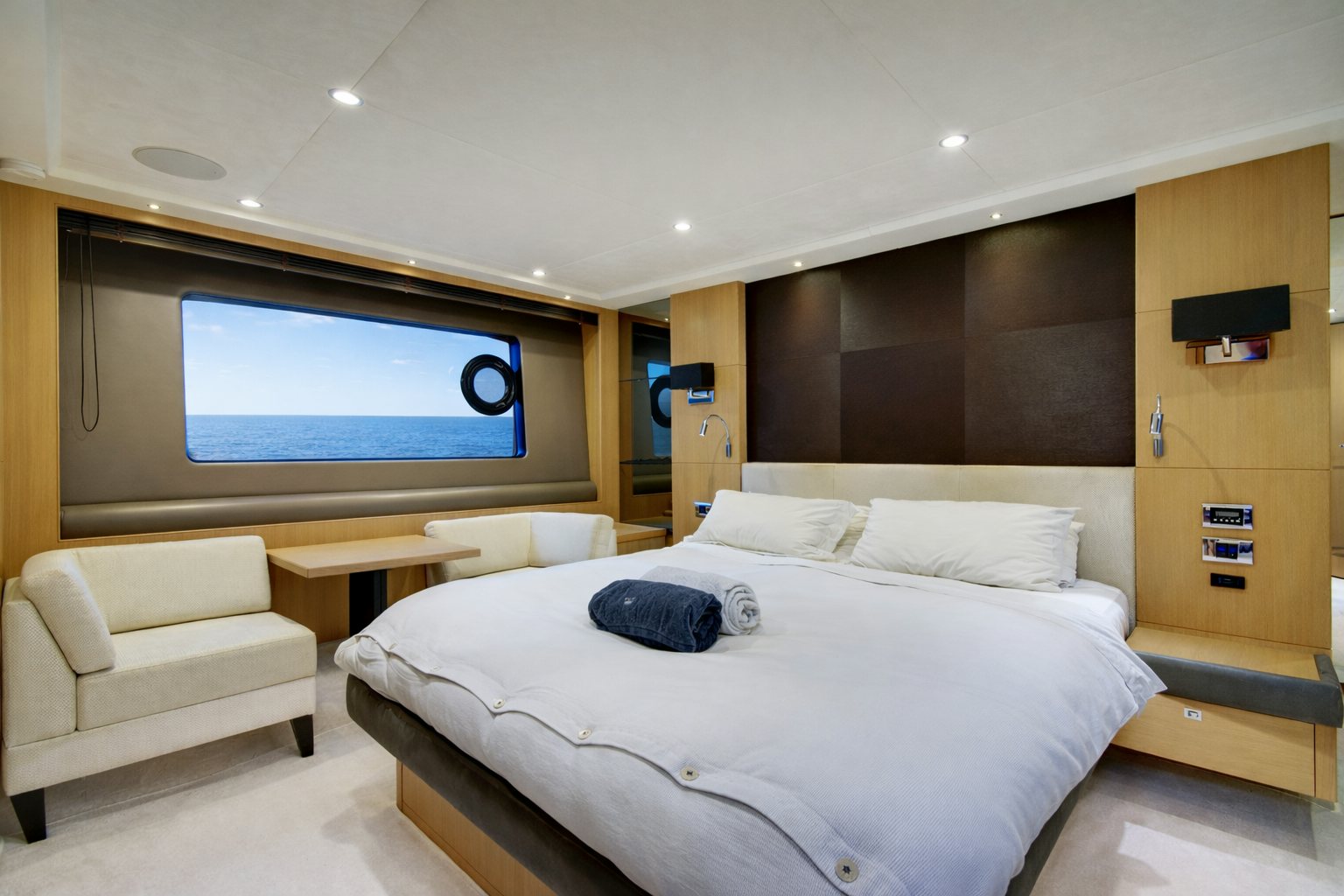 a room with a bed and a tv aboard GRAND CRU Yacht for Sale