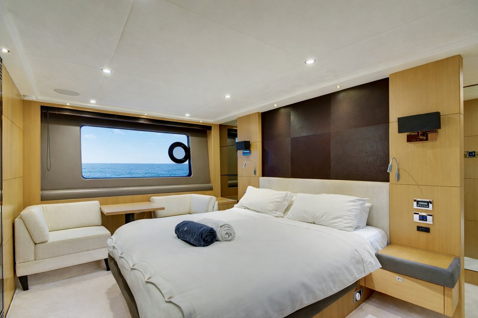 a room with a bed and a tv aboard GRAND CRU Yacht for Sale