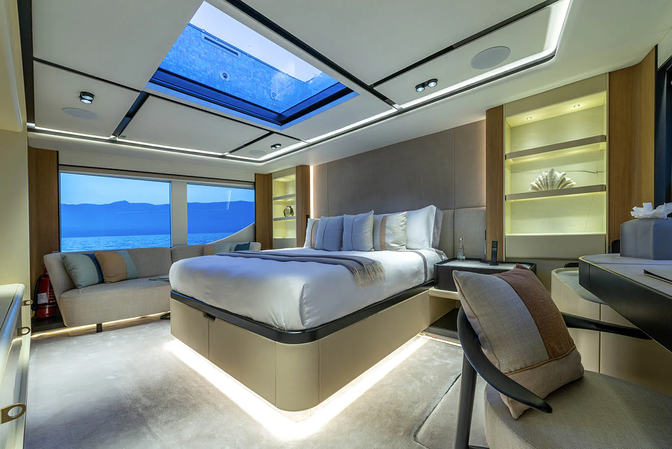 a room with a bed and a tv aboard ALKHADRA Yacht for Charter