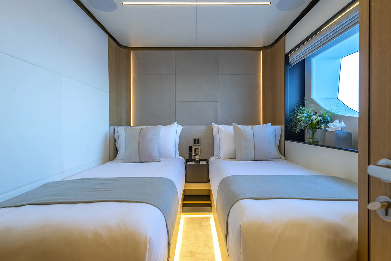 a room with two beds aboard ALKHADRA Yacht for Charter