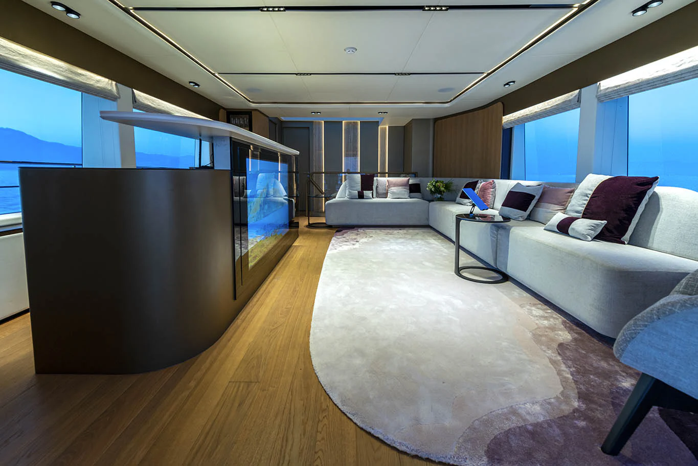 a living room with a large screen aboard ALKHADRA Yacht for Charter