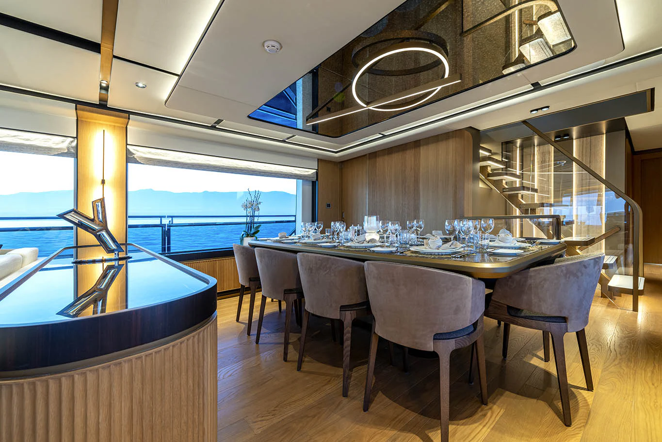 a room with a table and chairs aboard ALKHADRA Yacht for Charter