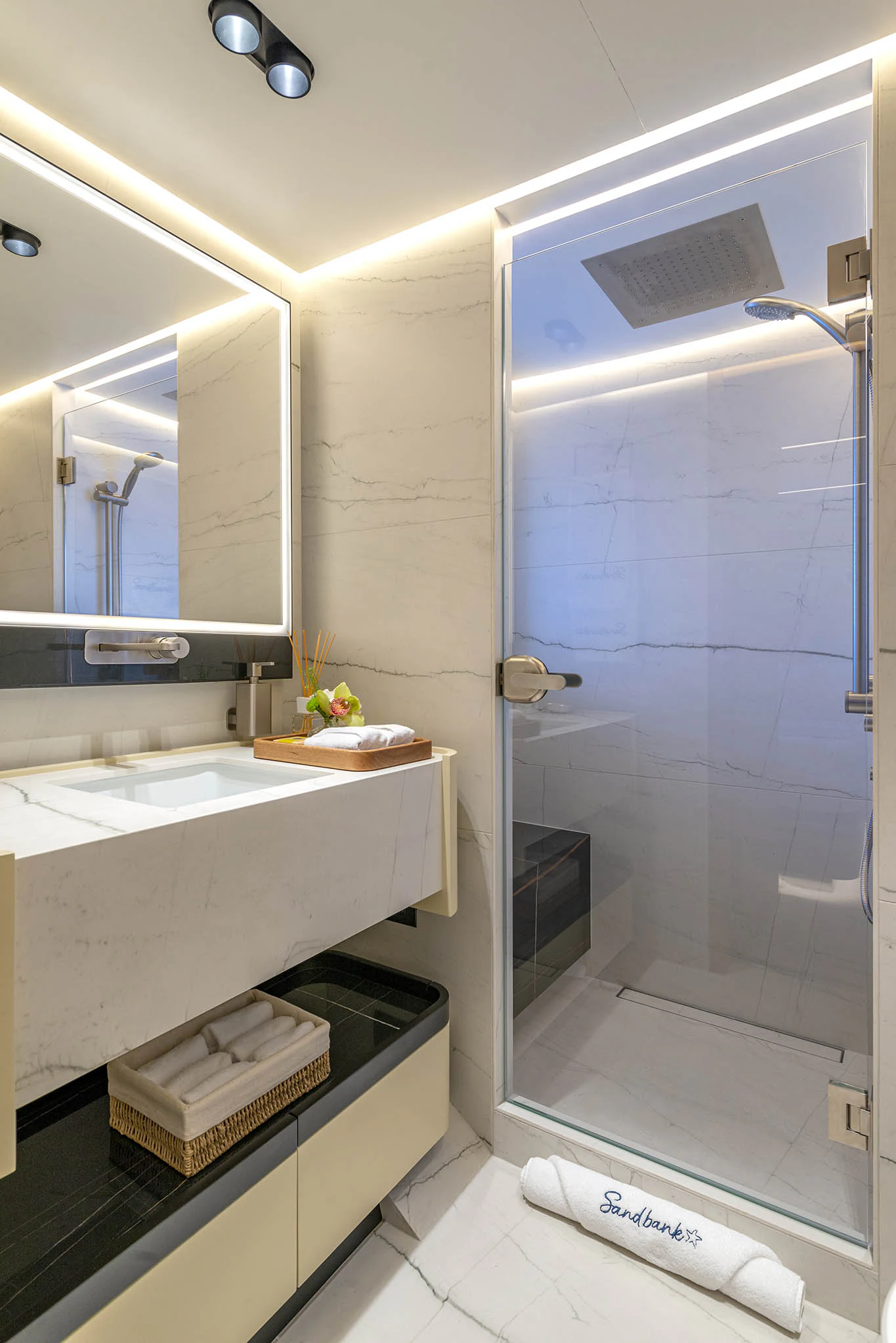 a bathroom with a sink and a shower aboard ALKHADRA Yacht for Charter