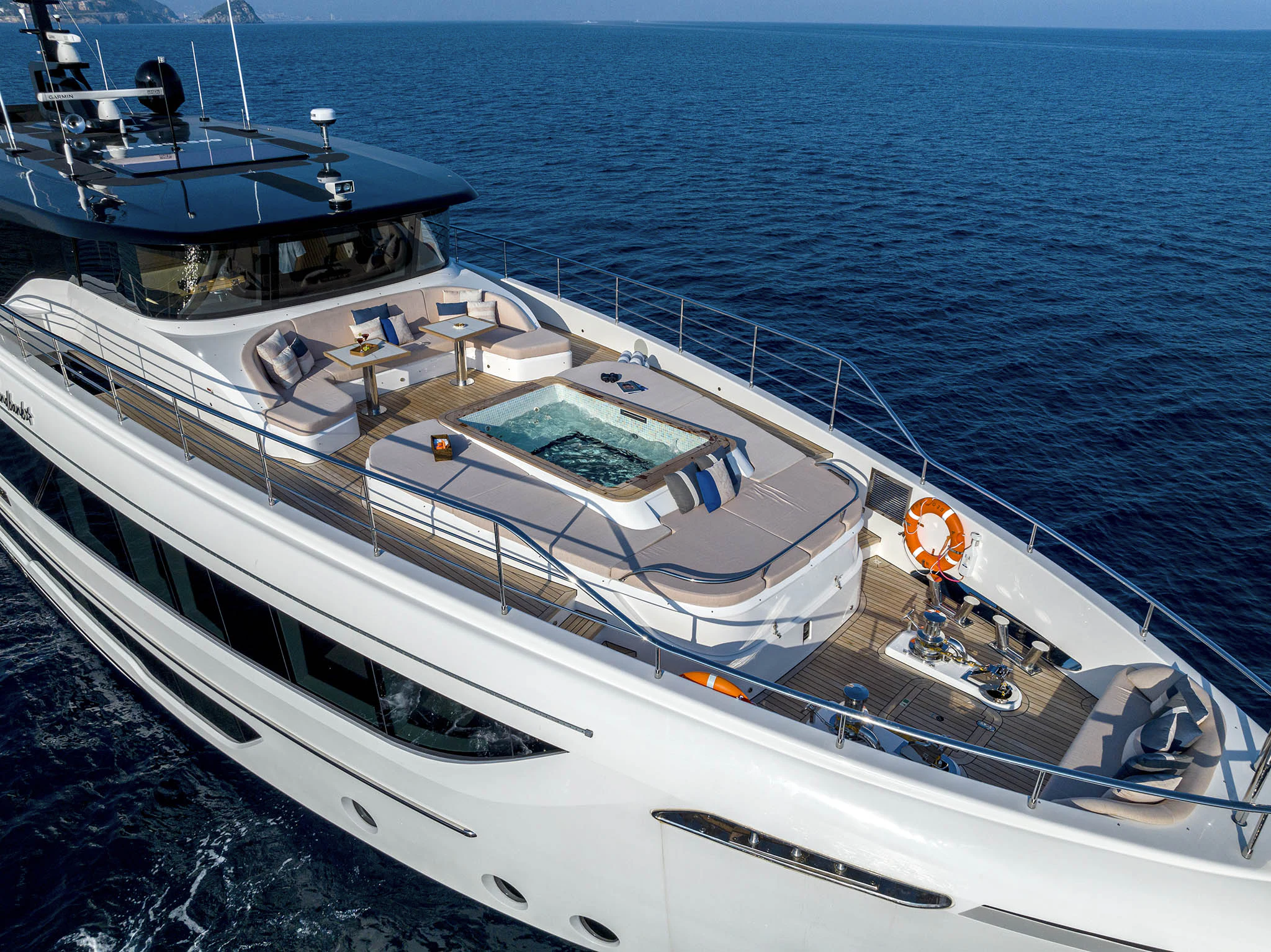 a large white boat in the water aboard ALKHADRA Yacht for Charter