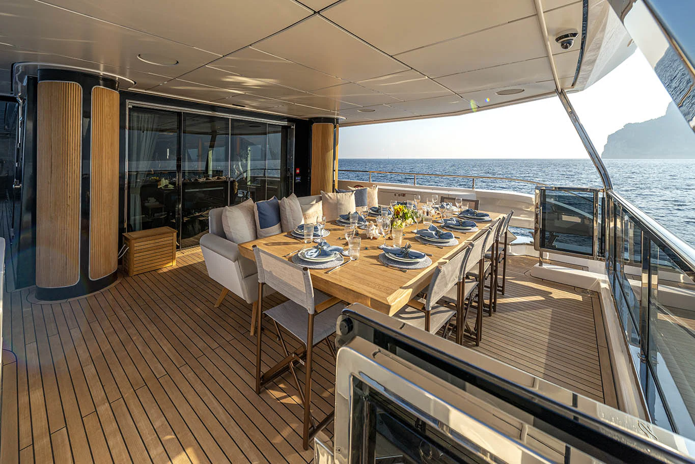 a dining table on a deck aboard ALKHADRA Yacht for Charter