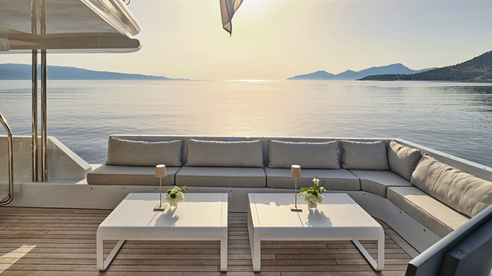 a couch and table on a boat aboard GELLY Yacht for Charter