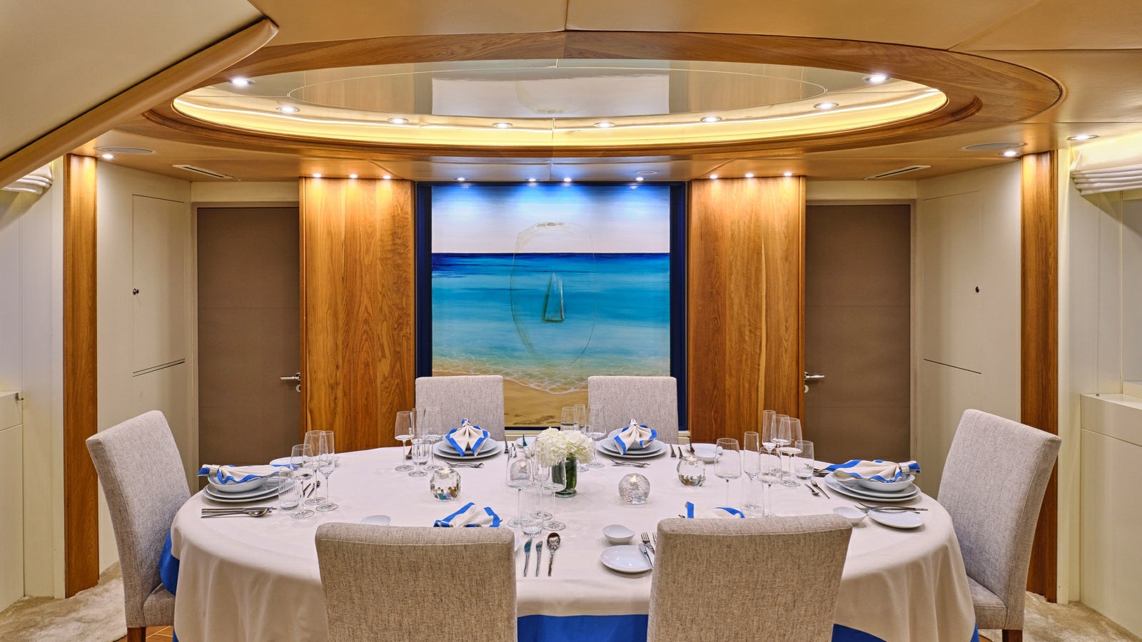 a table set for a dinner aboard GELLY Yacht for Charter