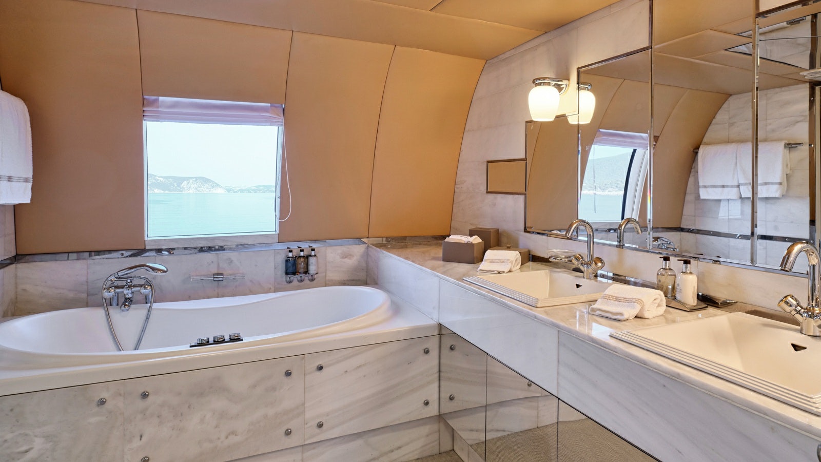 a bathroom with a large bathtub aboard GELLY Yacht for Charter