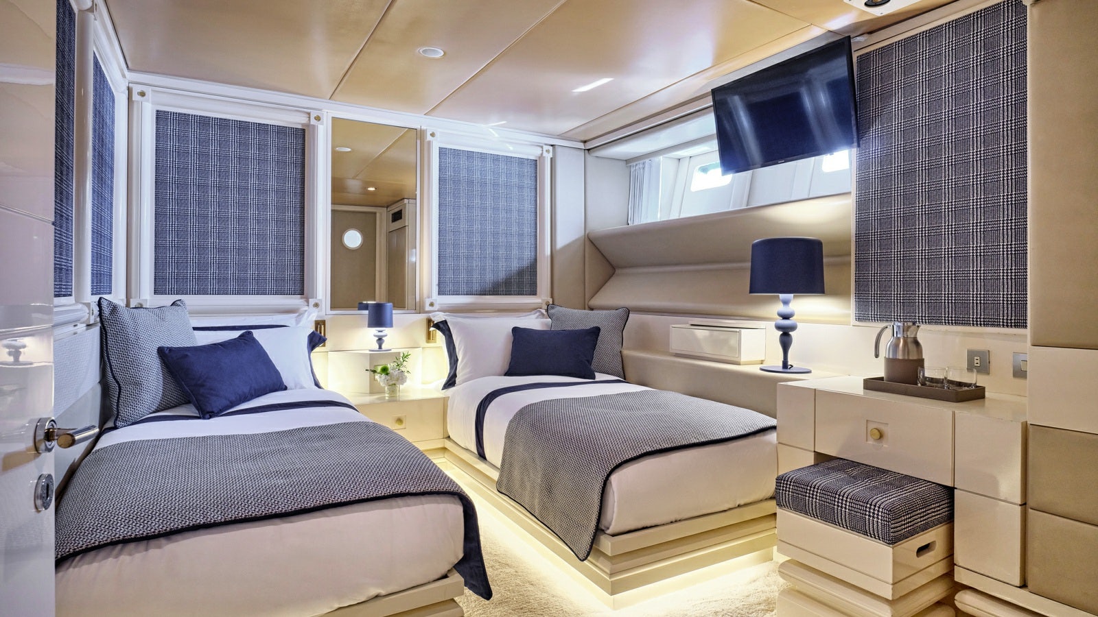 a room with two beds aboard GELLY Yacht for Charter