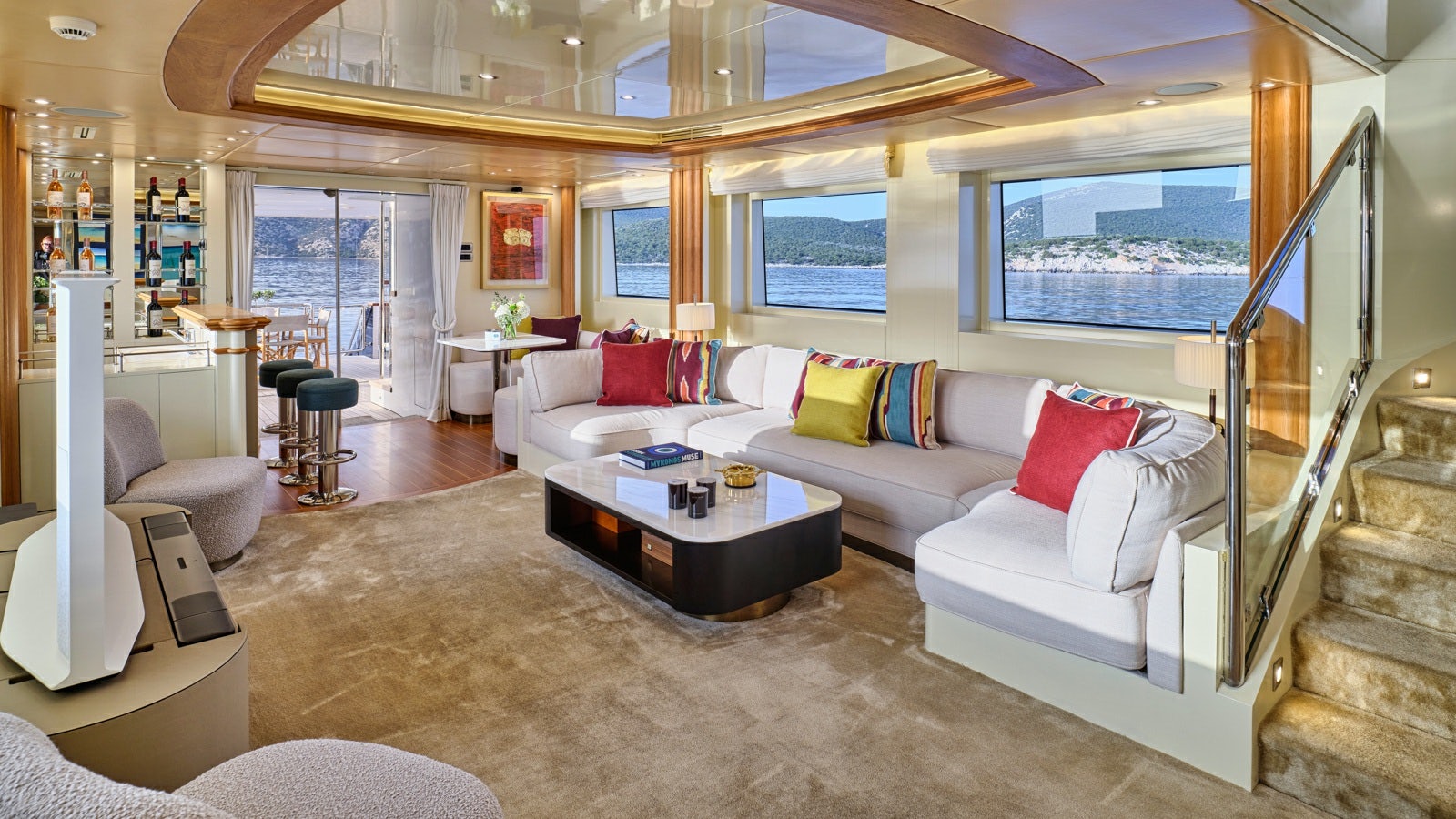 a living room with a large window aboard GELLY Yacht for Charter