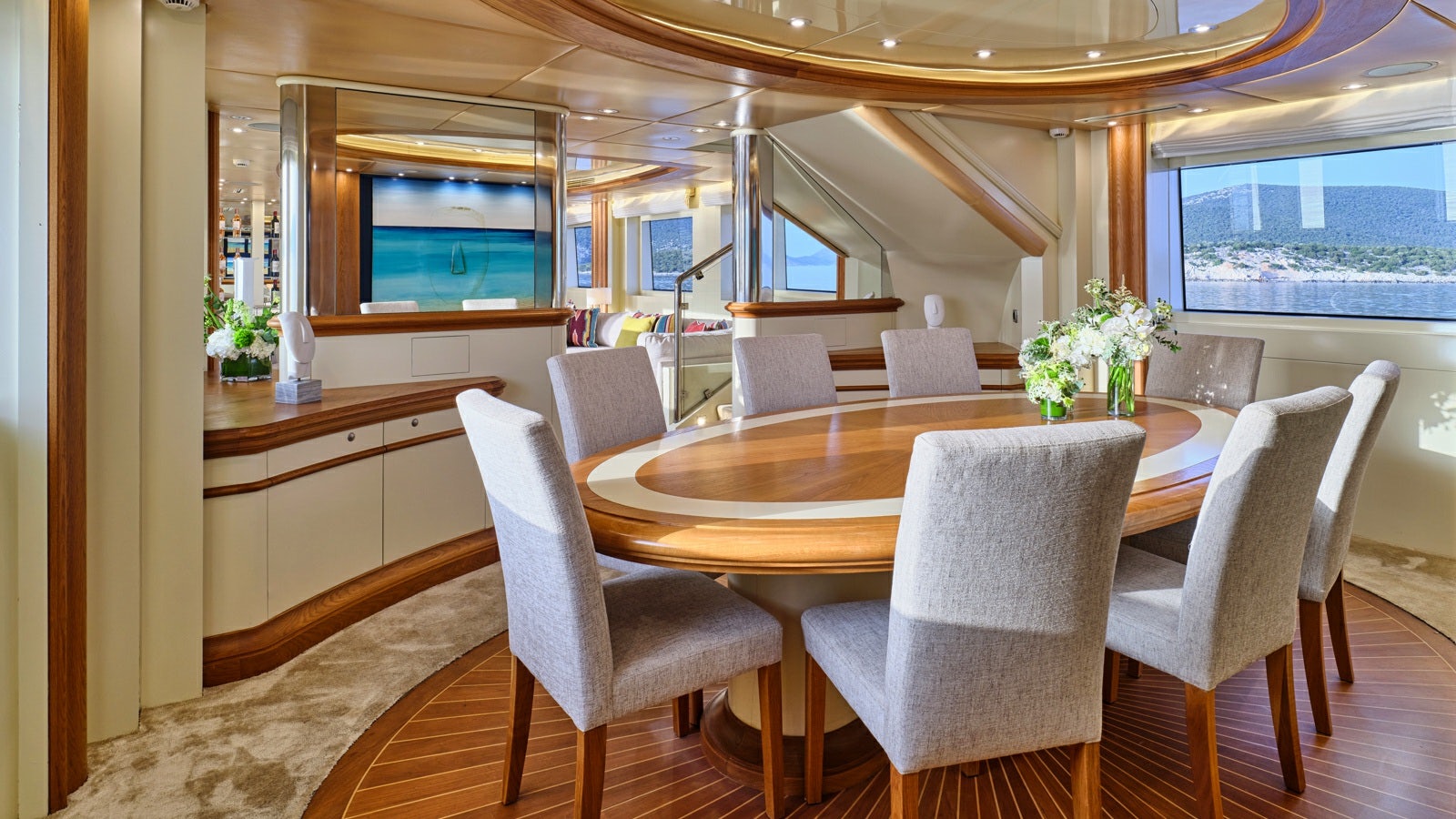 a dining room with a table aboard GELLY Yacht for Charter