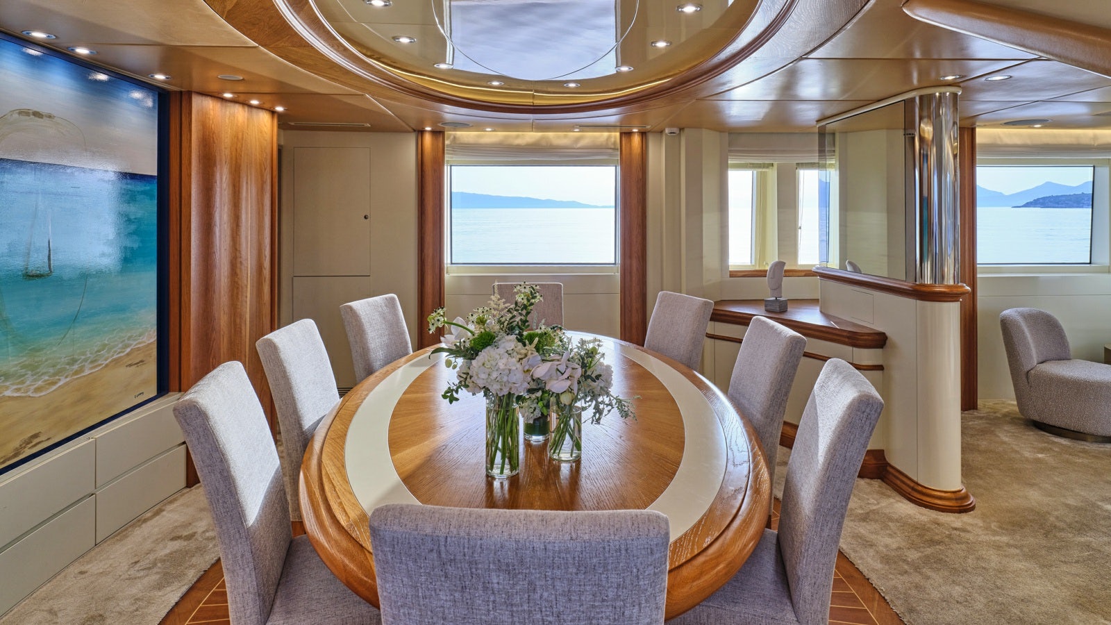 a dining room with a table and chairs aboard GELLY Yacht for Charter