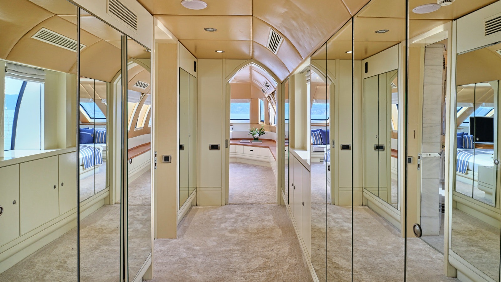 a hallway with glass doors aboard GELLY Yacht for Charter