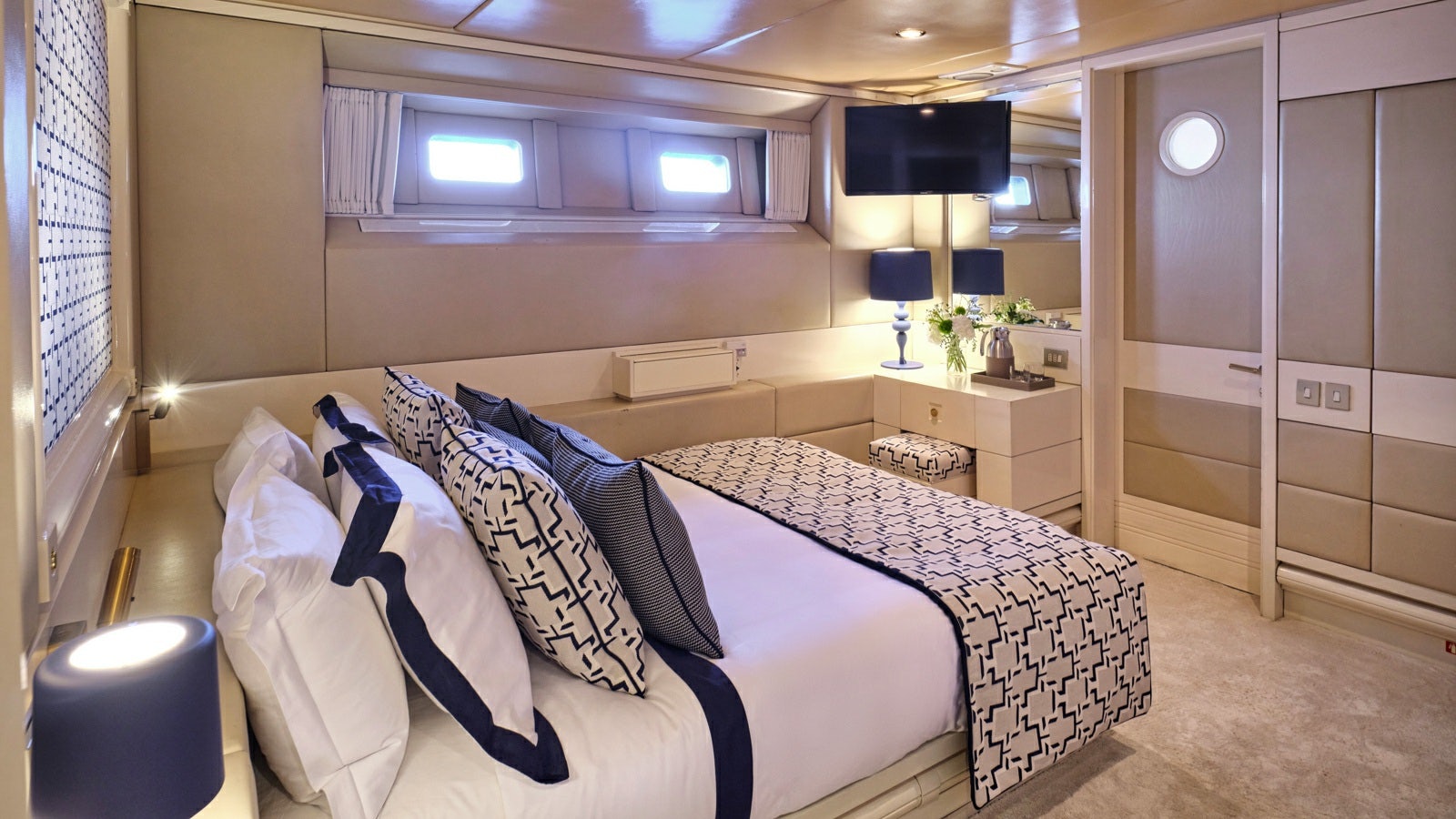 a bed in a room aboard GELLY Yacht for Charter