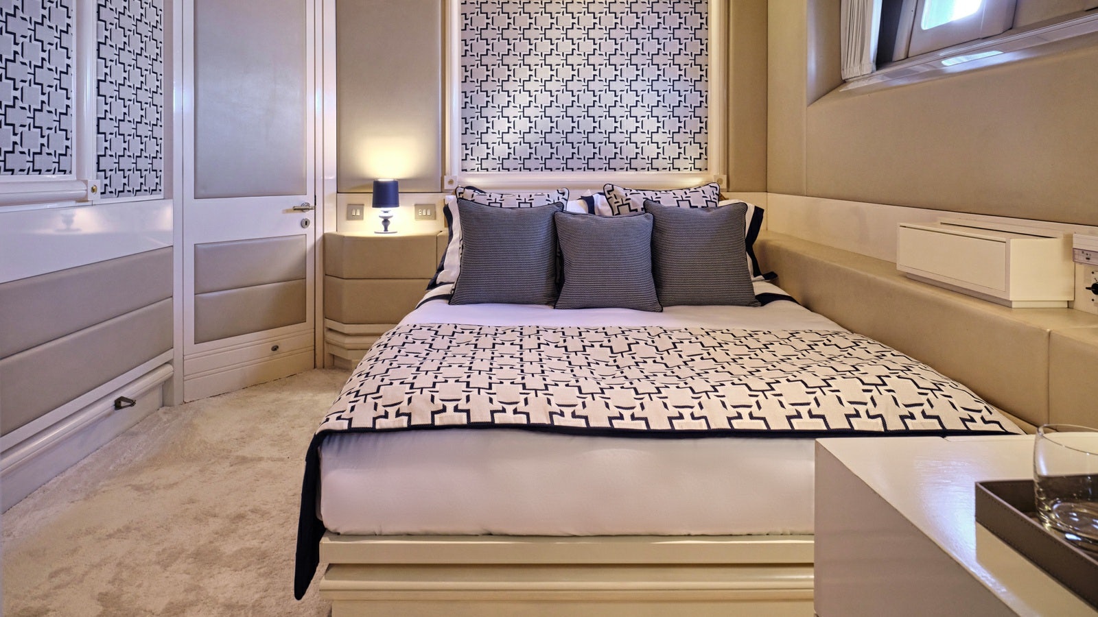 a bed with a white sheet aboard GELLY Yacht for Charter