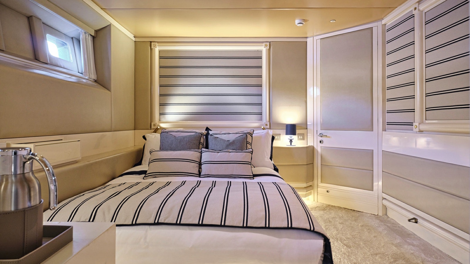 a bed in a room aboard GELLY Yacht for Charter