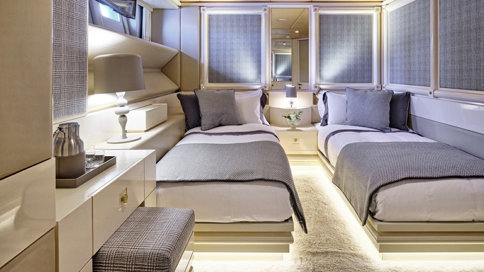 a room with a couple of beds aboard GELLY Yacht for Charter