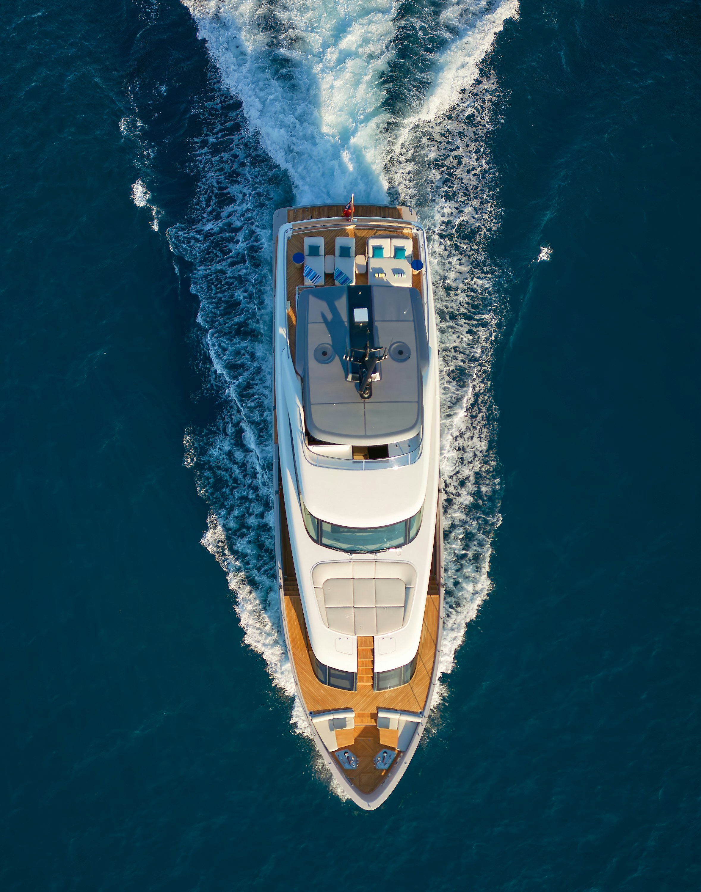a white and orange ship in the water aboard AZZURRI Yacht for Charter
