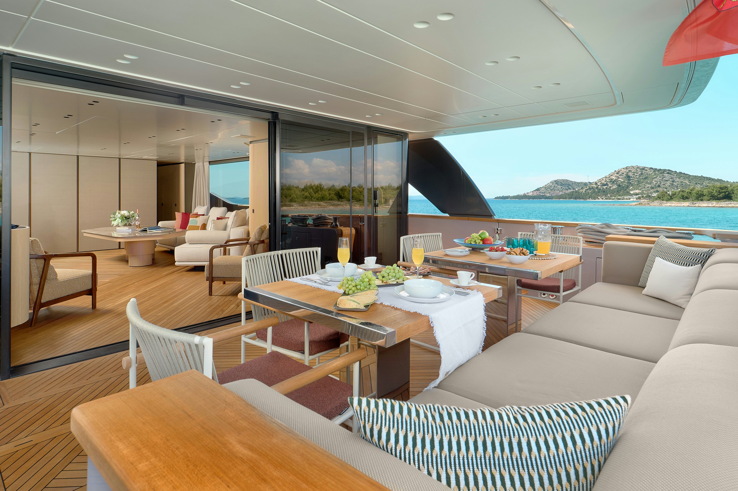 a room with a table and chairs aboard AZZURRI Yacht for Charter