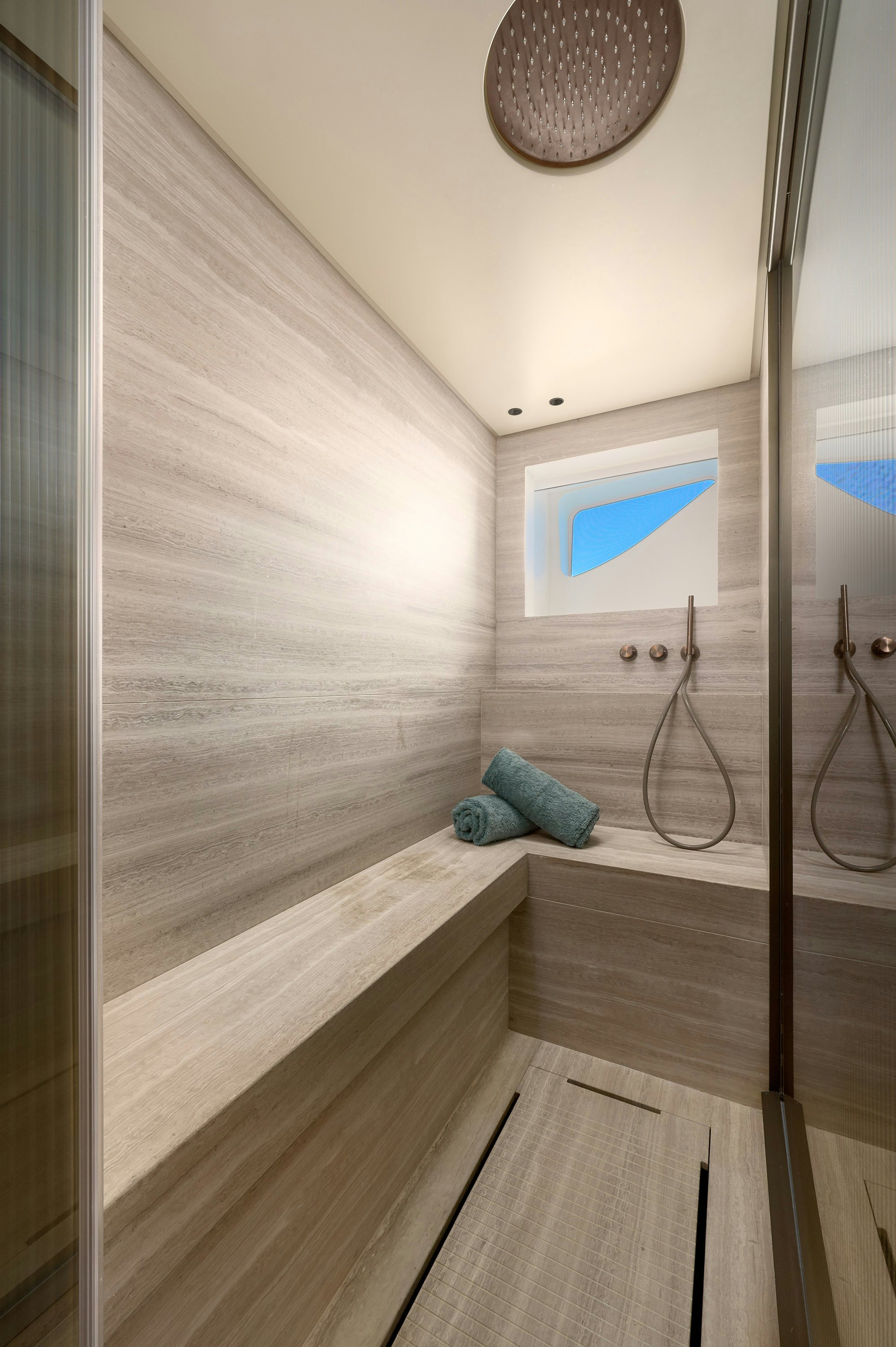 a room with a wood floor and a mirror aboard AZZURRI Yacht for Charter