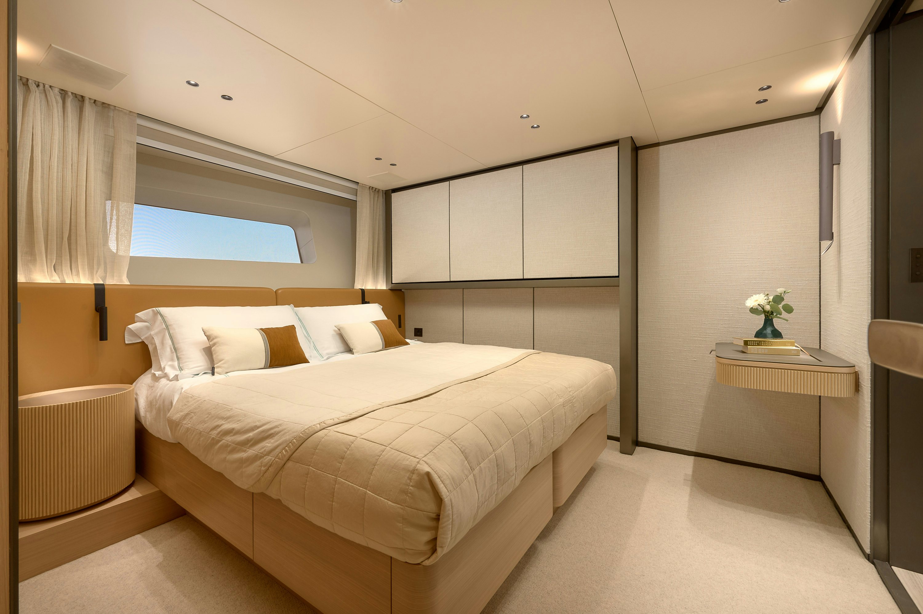 a bed in a room aboard AZZURRI Yacht for Charter