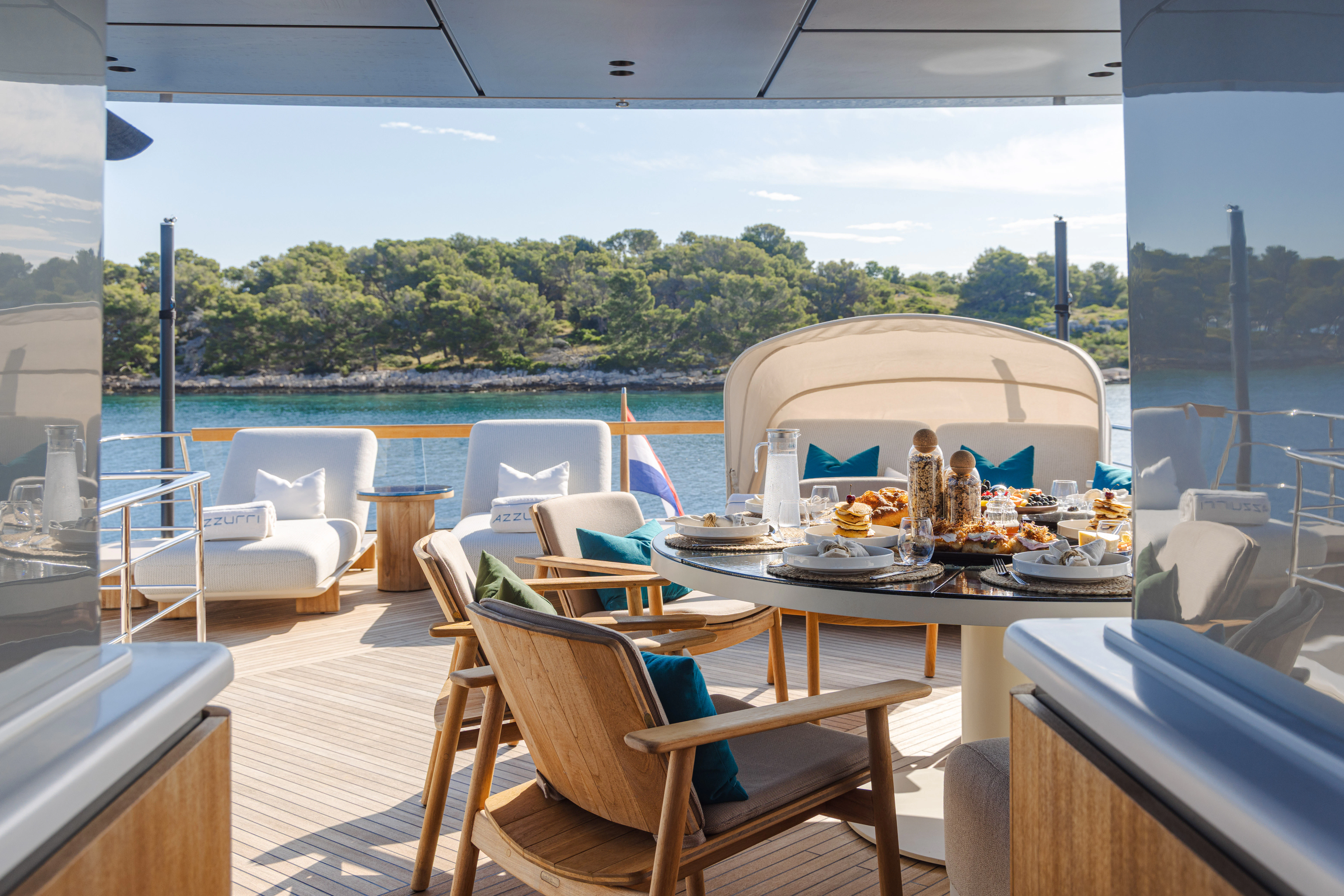 a table with food on it aboard AZZURRI Yacht for Charter