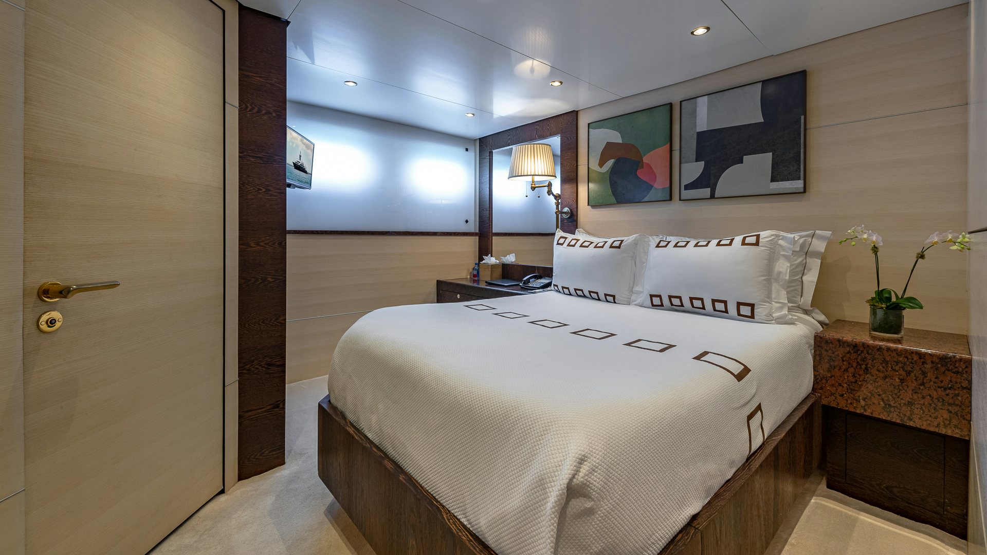 a bed in a room aboard HIGHLANDER Yacht for Charter