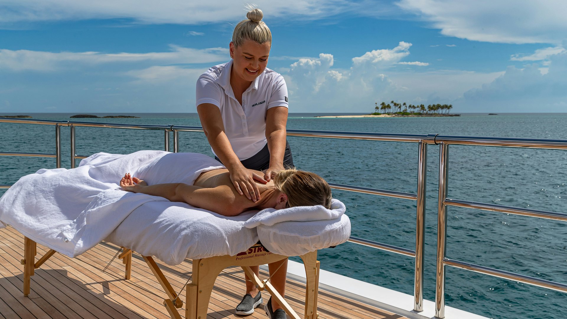 a person and a child on a boat aboard HIGHLANDER Yacht for Charter