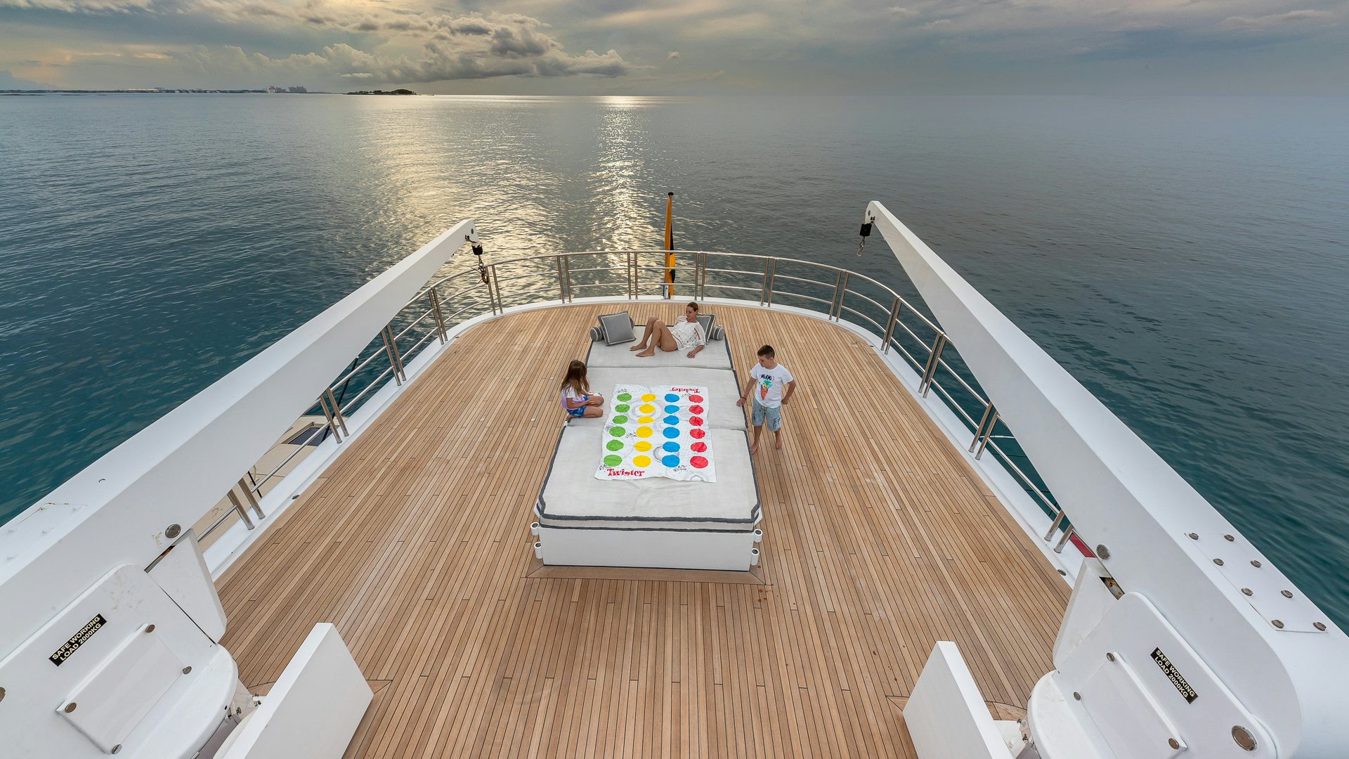 a group of people on a deck on a boat aboard HIGHLANDER Yacht for Charter