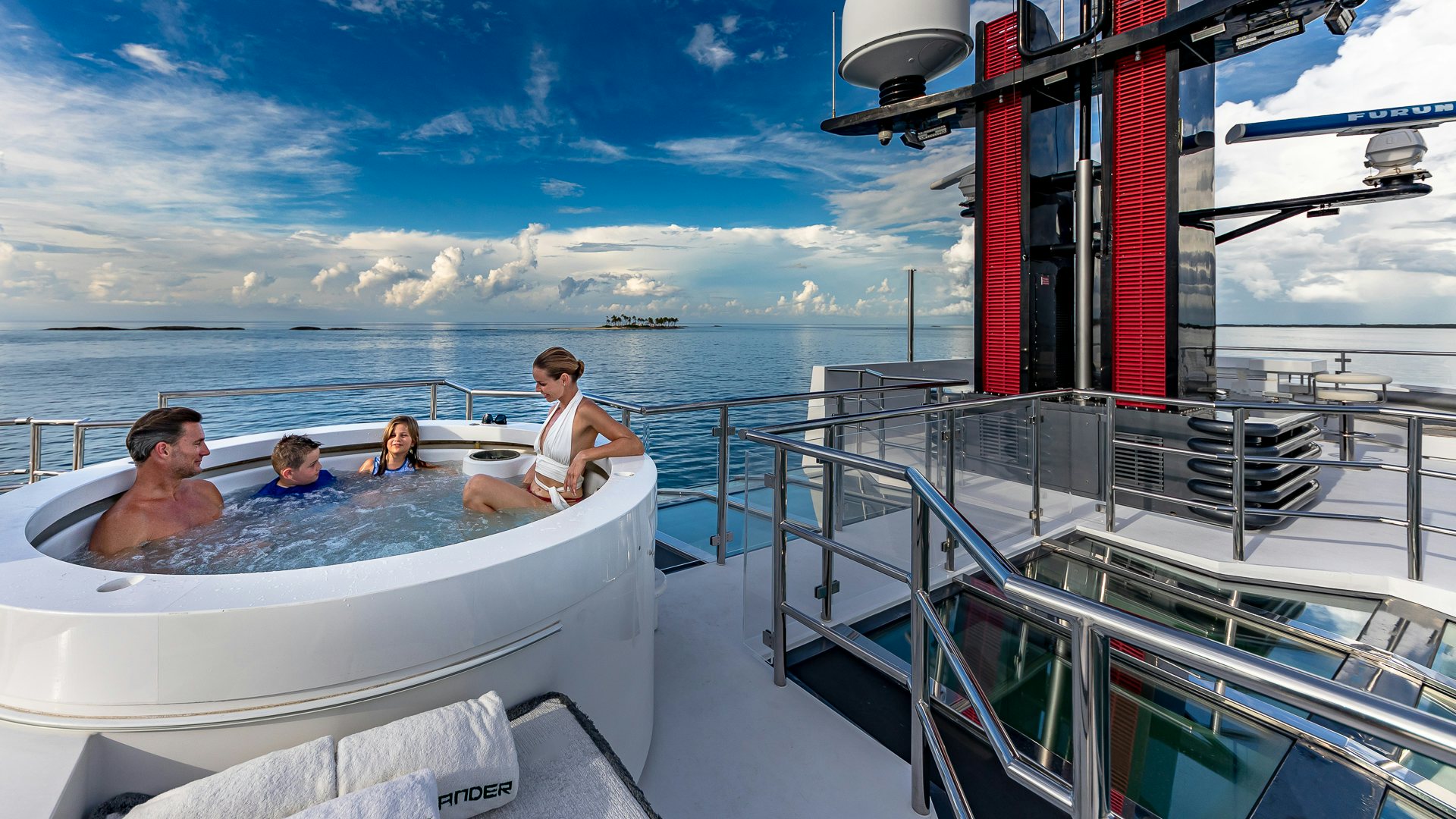 a group of people in a boat aboard HIGHLANDER Yacht for Charter