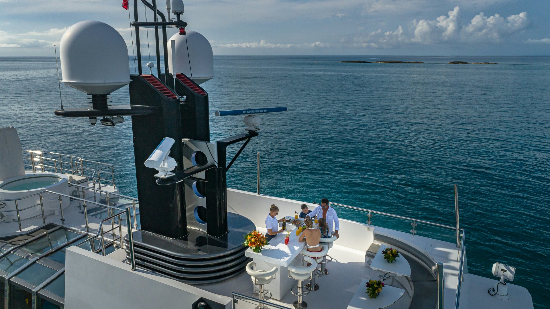 a group of people on a boat aboard HIGHLANDER Yacht for Charter