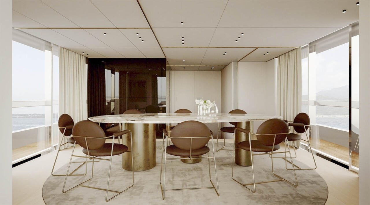 a room with tables and chairs aboard OCEAN KING DOGE 350 Yacht for Sale