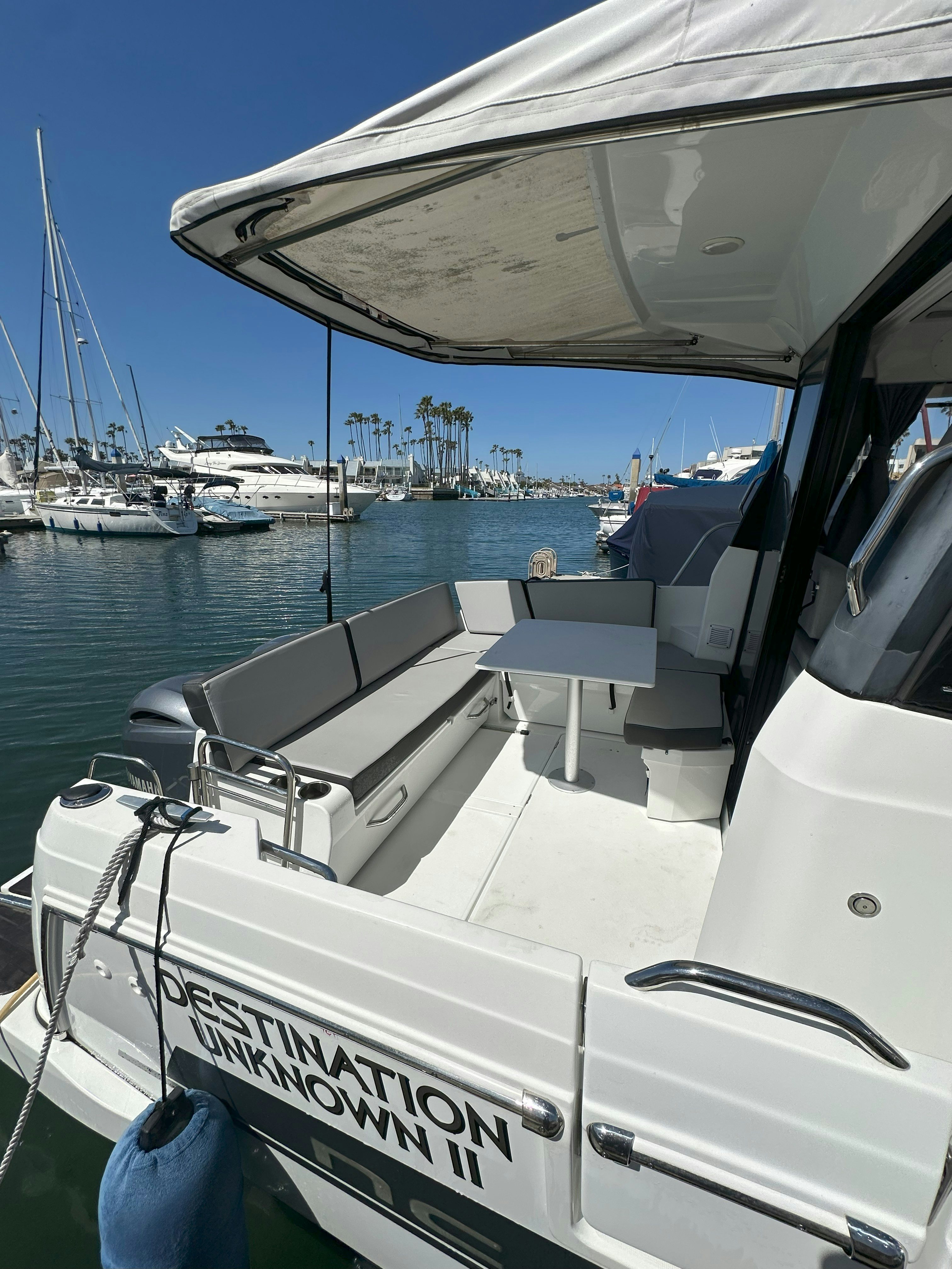 a boat in the water aboard DESTINATION UNKNOWN II Yacht for Sale
